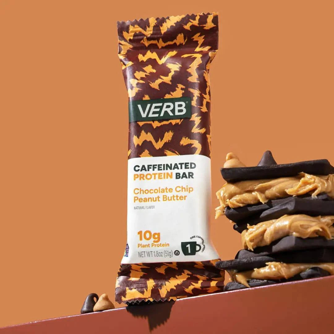 Verb caffeinated protein bar with chocolate chip and peanut butter flavor on an orange background