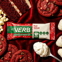 Red Velvet energy bar surrounded by red velvet cookies and cream on a red background