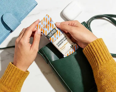 Verb energy bar in a green purse